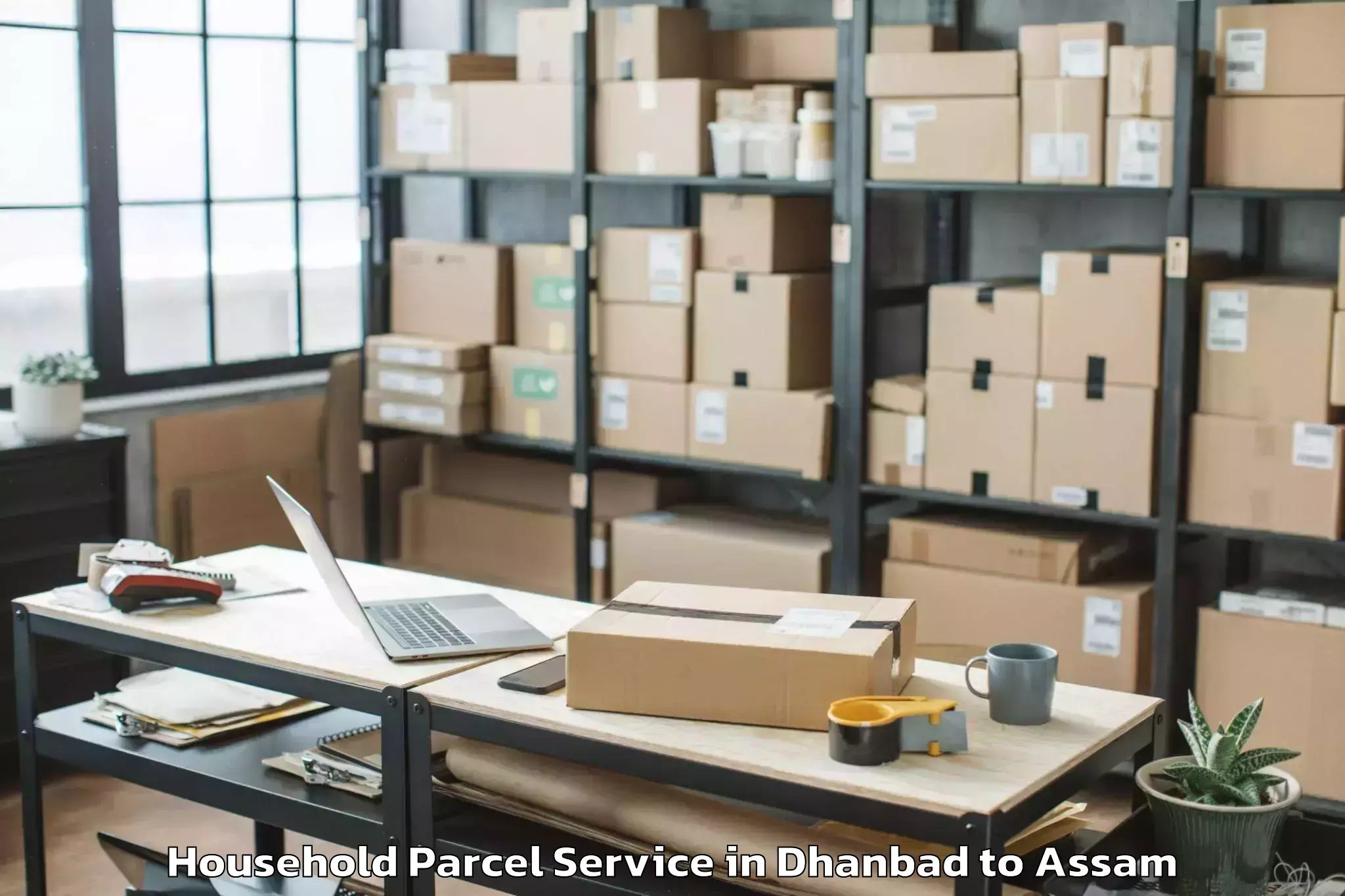 Top Dhanbad to Chaparmukh Household Parcel Available